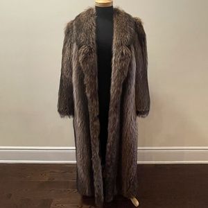 Luxurious long raccoon fur coat. Size 14.